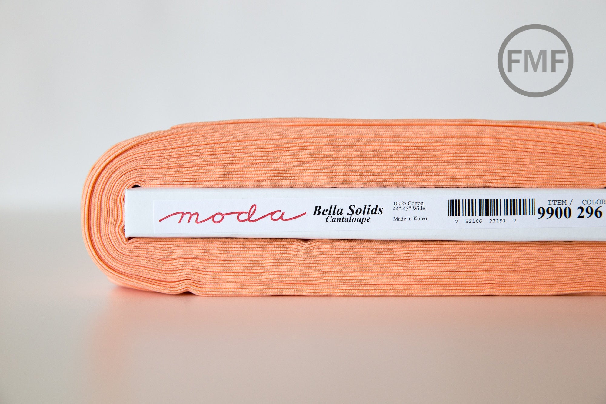 Cantaloupe Bella Cotton Solid Fabric from Moda, 9900 296