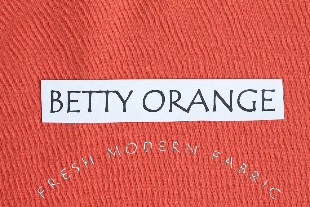 Betty Orange Bella Cotton Solid Fabric from Moda, 9900 124